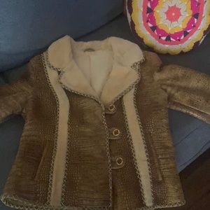 One of a kind vintage Shearling leather fur jacket. Retails for 2300 . Get now!!